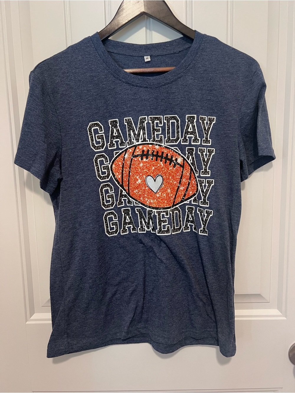 Amazon Navy Blue Tee with Orange Football Graphic
